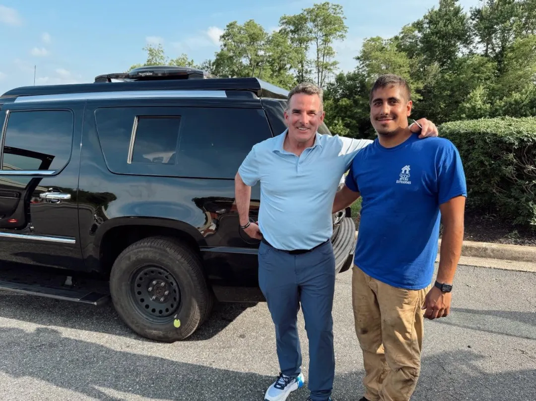 Baltimore Pressure Washing owner with a local team member