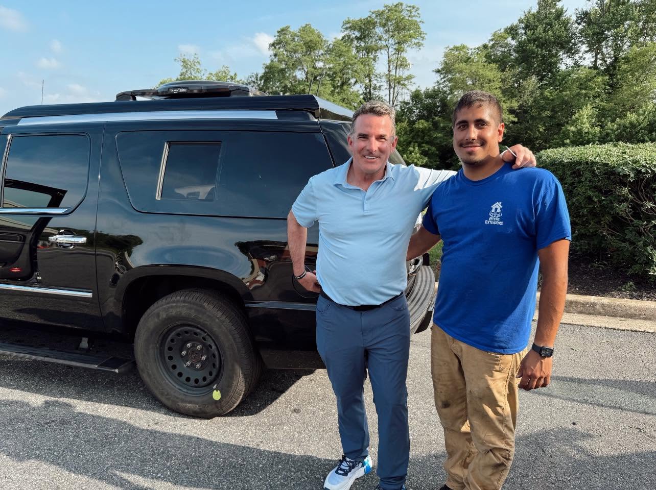 Baltimore Pressure Washing owner with a local customer